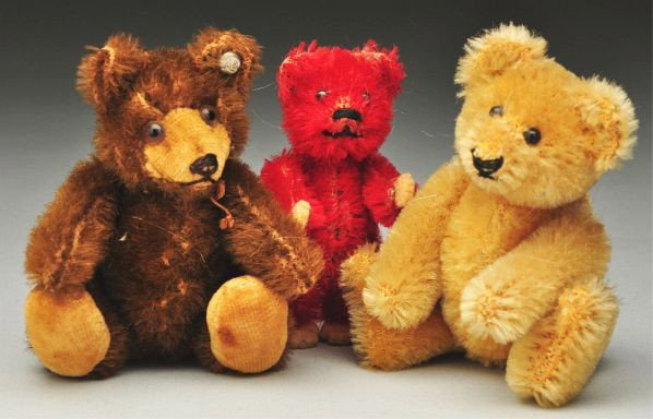 Lot of 3: Miniature Bears.: Description Includes one brown Steiff teddy baby, circa 1953, with US Zone tag and raised script button, one blonde Steiff teddy bear, circa 1950s, with black bead eyes, black stitched nose, and no ID