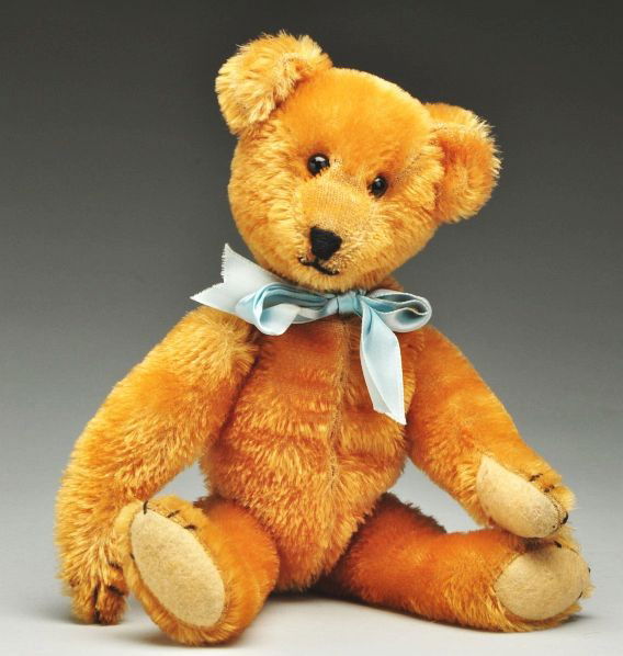 Ideal Gold Bear.: Description Circa 1908. Shoe button eyes and black stitched nose and claws. Condition (Excellent). Size 12 - 1/2" L.