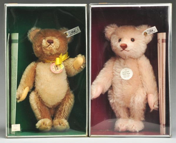 Lot of 2: Steiff Teddy Bears.: Description Lot includes a "Teddy Rose" bear and also a circa 1955 reproduction, with a neck mechanism. Both are mint in box. Condition (Mint).