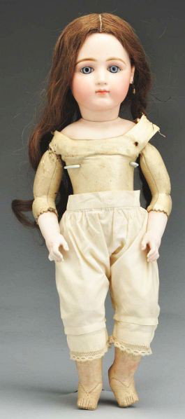 Early French Bisque Bébé Doll.: Description French bisque socket head incised 10, a portrait head made by Jumeau (1 ½" firing line behind ear), light long multistroked eyebrows, pink eye shadow, painted upper and lower eyelashes, l