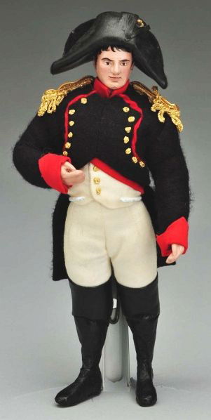 Napoleon Portrait Doll.: Description Composition face with very nice detail in presentation, wavy black eyebrows, dark painted eyes, short black hair with wispy bangs; cloth body, composition hands and molded black boots. Nic