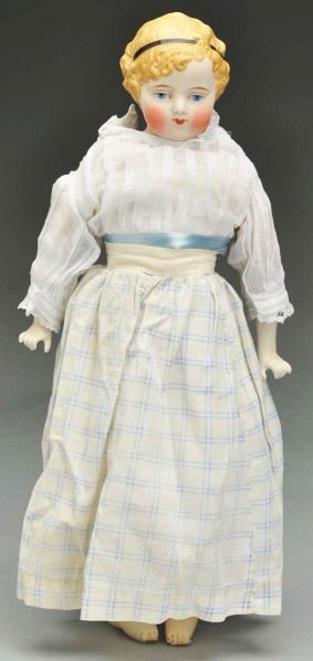 Lovely Parian Child Doll.: Description German parian bisque shoulder head with short curly blonde molded hair with black hair ribbon, blonde tapered eyebrows, red eyelid line, black eyelash line, blue painted eyes, red corner e