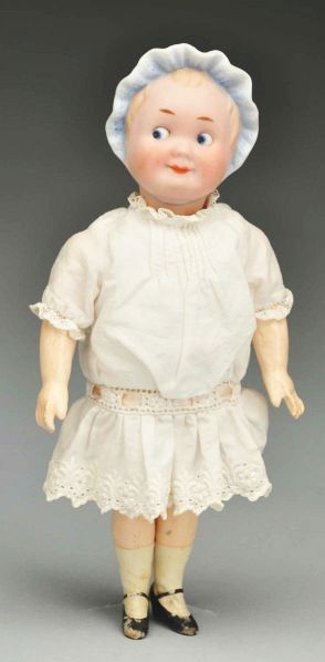 Rare Recknagle Googly Doll.: Description German bisque socket head incised "R. 44 A." Molded blue and white bonnet with molded ruffle around face, round intaglio side-glancing eyes, smiling closed mouth, 5-piece composition body