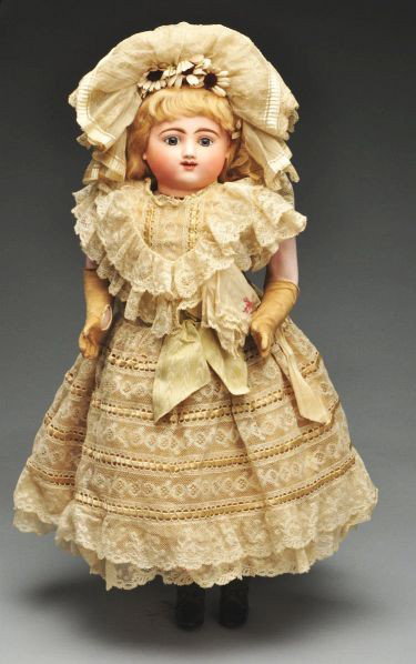 Jules Steiner Bébé.Gigoteur Doll.: Description French bisque Steiner head with multistroked eyebrows, painted upper and lower eyelashes, blue paperweight eyes, open mouth with lower teeth, chin dimple, original blonde mohair wig. Walki