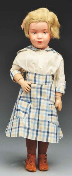 Pouty Schoenhut Character Doll.: Description All wood and spring jointed with Schoenhut mark. Original face paint (loss on cheek and nose, lips and nose dots repainted), original mohair wig, blue intaglio eyes, pouty mouth; vintage c