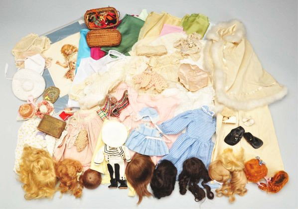 Lot of Antique Doll Clothes & Wigs.: Description Various sizes. 12 white undergarments, 3 white baby doll dresses, flannel baby coat with fur trim, small bag of lace, 3 baby doll hats; small baby sweater, 5 additional hat (2 are new); wo