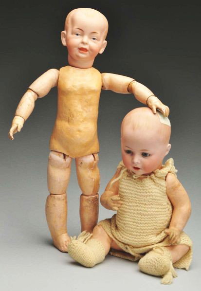 Two Bisque Character Dolls.: Description German bisque socket head incised "FB" by Fritz Bierschenk, molded hair painted features, excellent modeling around the mouth, French jointed composition and wood body (wear, toes chipped,