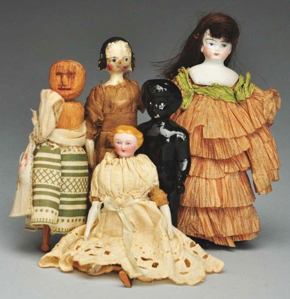 Lot of 5: German Dolls.: Description Parian doll house lady with blonde hair, cloth body, parian limbs (foot broken off); 1920s shoulder head girl with cloth body and original crepe paper dress; black china frozen charlotte;