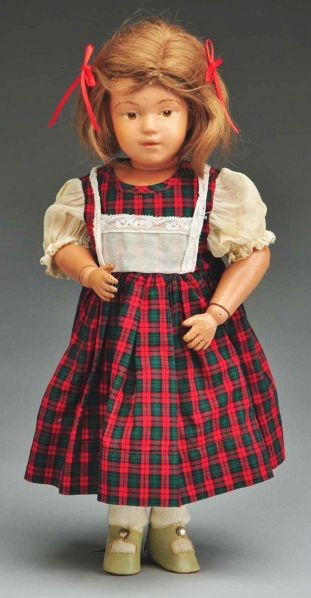 Pouty Schoenhut Character Doll.: Description All wood and spring jointed with Schoenhut label; original face paint (extensive touch up on mouth, chin nose, eyebrow repainted, chip on neck), brown intaglio eyes, original mohair wig; r