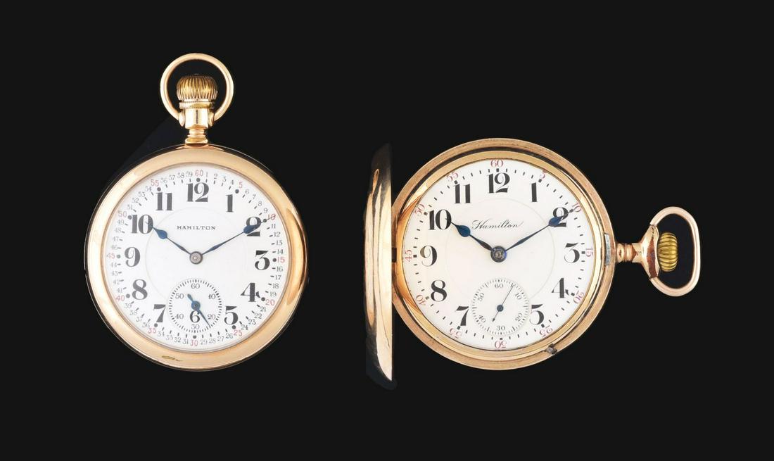 LOT OF 2: HAMILTON GOLD FILLED 927 & 990 POCKET WATCHES.: Hamilton Watch Co., Lancaster, PA., gold filled pocket watches. (A) C. 1907 open face case marked "Hamilton Watch Co., Lancaster, Pa., C.W.C.CO. Trademark, 2485113, Warranted, Crescent, 25 Years," 53m
