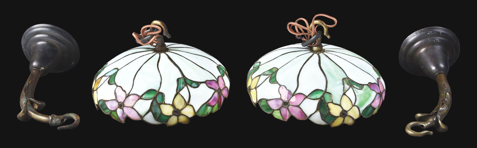 PAIR OF JOHN MORGAN & SONS LEADED GLASS SCONCES.: A beautiful matching pair of leaded glass sconces by John Morgan & Sons. Each shade measures 11" in diameter, and is comprised of streaked green background glass with a pattern of pink and yellow flow