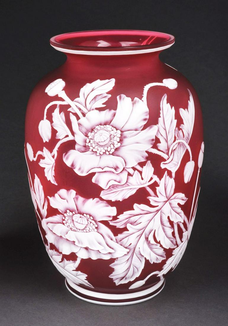 WEBB CAMEO ETCHED FLORAL VASE.: C. 1900. This stunning Thomas Webb two-color cameo vase is raised on a short foot and is finely cut with flowers and stem.Condition:(Mint).Dimensions:5 - 1/2" x 5 - 1/2" x 8 - 3/4".