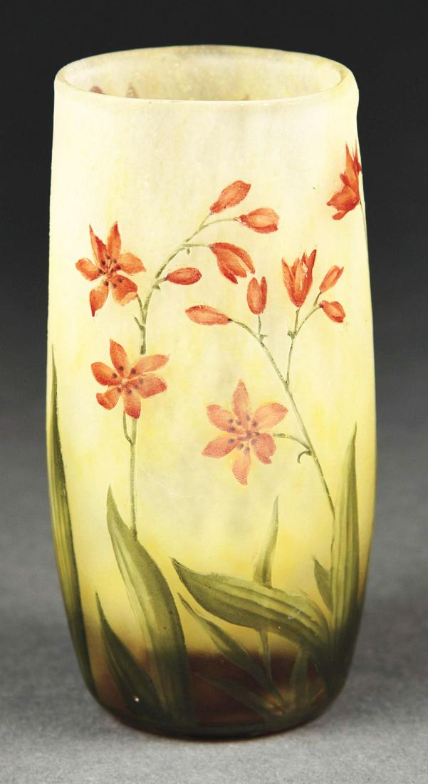 DAUM TUMBLER W/ RED FLOWERS.: A beautiful floral tumbler by Daum. The 4 - 3/4" tall tumbler has a background of frosted yellow and cream-colored glass. It is further decorated with red flowers and green leaves. The body is signed