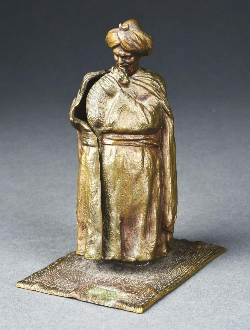 EROTICA BRONZE MAN IN TURBAN HOLDING CAT. (1 of 8)