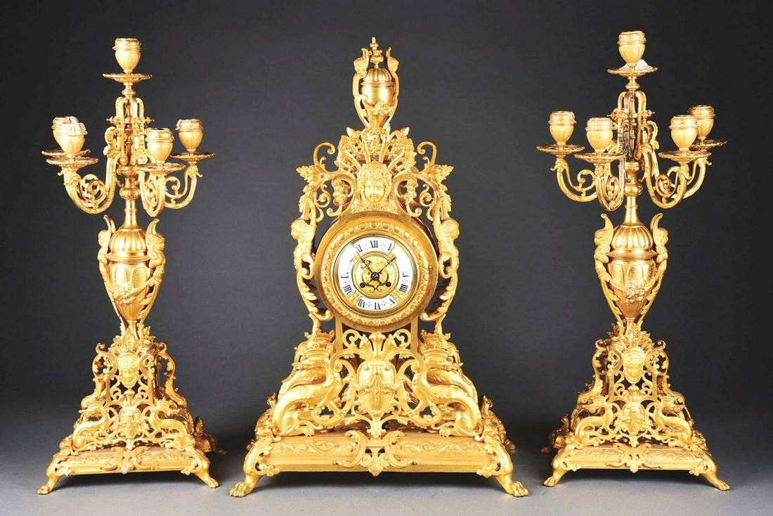 BRONZE GOLD GILTED CLOCK TIME & STRIKE WITH PAIR OF CANDELABRA. (1 of 7)