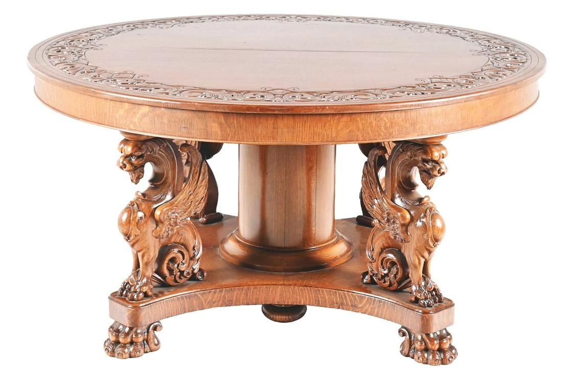 QUARTER SAWN OAK WINGED GRIFFIN DINING TABLE. (1 of 6)