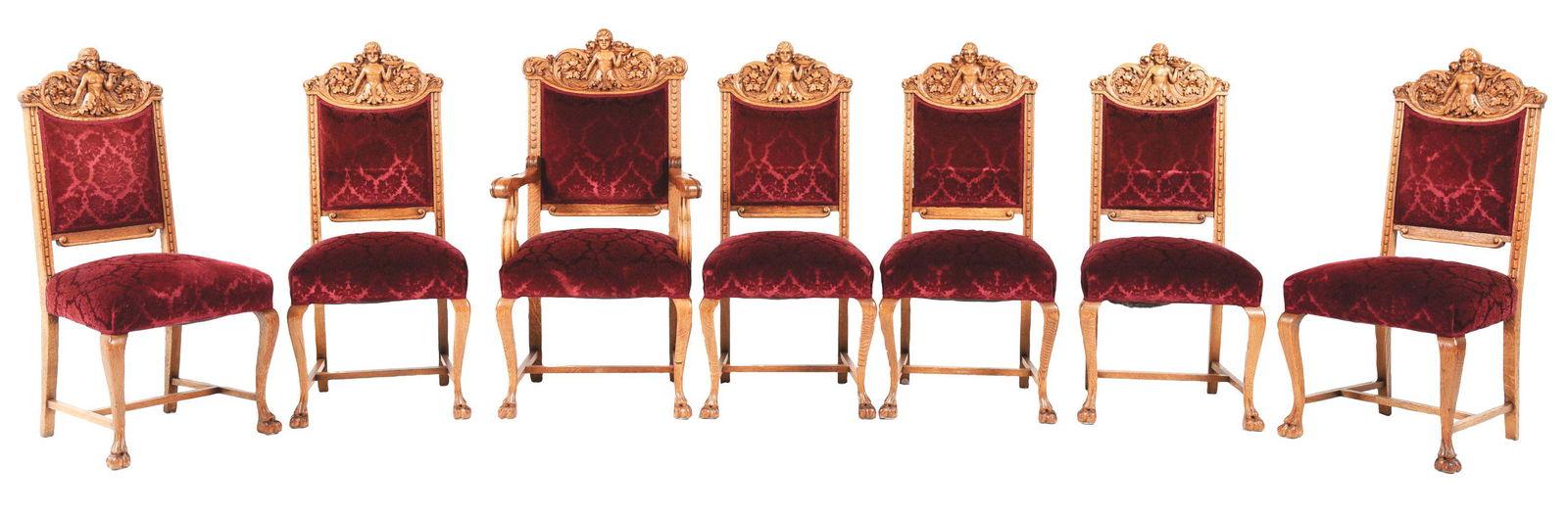 LOT OF 7: CARVED AND UPHOLDSTERED OAK CHAIRS. (1 of 1)