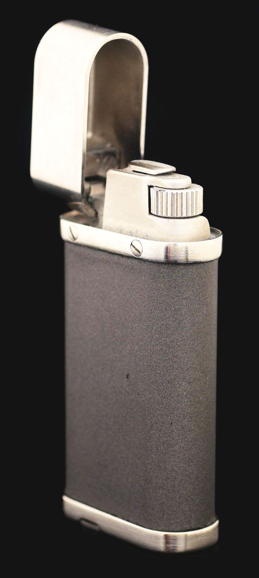 CARTIER OVAL LIGHTER WITH ORIGINAL BOX. (1 of 7)