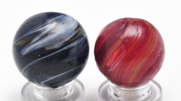 Lot of 2: Handmade Marbles.: Description Smaller marble is a butterscotch with transparent amber and red glass and yellow threads that cover the marble, just under surface. Photo list: C and D. Larger marble is an opaque brown ba
