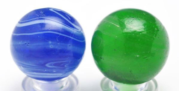 Lot of 2: Leighton Transitional Marbles.: Description The first marble is a single faceted pontil in blue translucent glass. White swirling around surface and small ""core"" of white above pontil. Photo list: B, C, and D. The second marble is