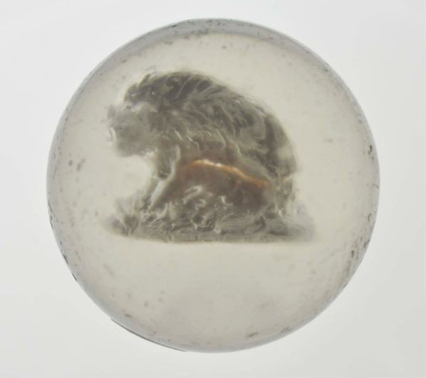 Wolf Sulphide Marble.: Description Great figure of wolf with neck turned. Hard-to-find figure in a sulphide. One fracture around legs, at base. Condition (8.7). Size 2"" Dia."