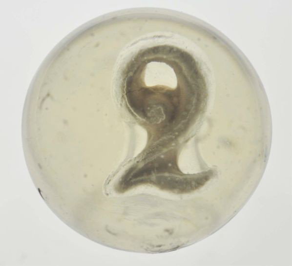 Number 2 Sulphide Marble.: Description Nice number two figure, slightly centered to the left. One slight air bubble around figure. Still shows minor chips. Condition (Polished). Size 1 - 5/8"" Dia."