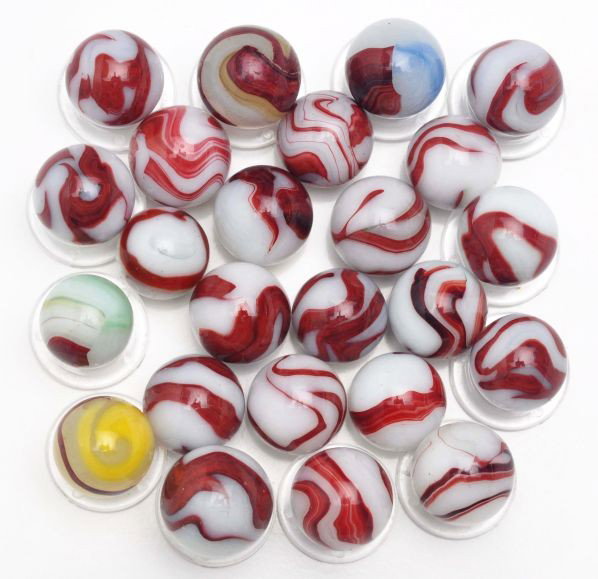 Lot of 24: Akro Agate Oxblood Marbles.: Description Includes 20 white onyx oxblood swirls, two patched oxbloods, one silver onyx, and one egg yolk oxblood. Condition (9.6). Size Range: 9/16"" to 5/8"" Dia."