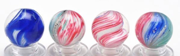 Lot of 4: Onionskin Marbles.: Description Includes two onionskins with mica, one rare one-lobed onionskin with a heavy twist, and one very hard-to-find blue and white cloud with some internal fractures. Condition (9.4). Size Range