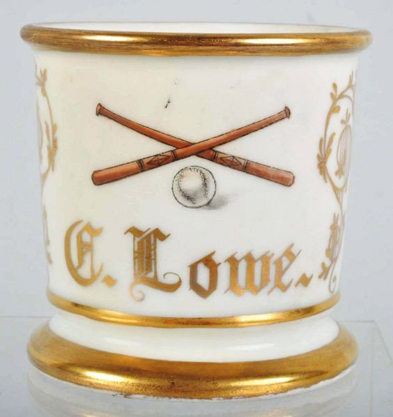 Baseball Shaving Mug.: Description Shows two crossed bats and a ball signed "F. Lowe". Marked "7919". Includes an original receipt from Vim Sporting Goods.Condition (Near Mint). Size 3 - 3/4" T.
