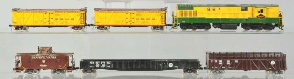 Brass HO Scale Freight Car Train Set.: Description Made in Korea. Includes Pennsylvania Reading Lines 867 engine and five passenger cars. This may not be a cataloged set. Includes original boxes.Condition (Very Good).