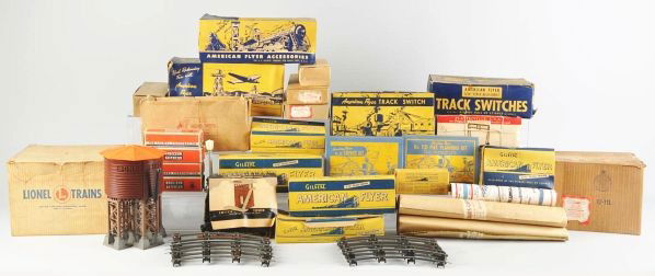 Lot of American Flyer & Lionel Train Accessories.: Description Includes American Flyer S-gauge remote control track switches, an uncoupler, A.C. Gilbert kits, a few plastic houses, several no. 1971 Lionel Lamp Posts, and many other items. Most in thei