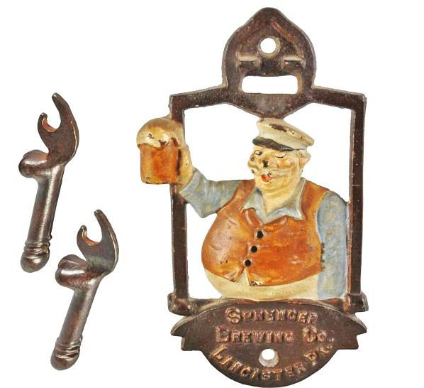 Lot of 3: Cast Iron Bottle Openers.: Description Includes one depicting a Beer Drinker advertising "Springer Brewing Co. Lancaster, PA" and two naughty figural bottle openers.Condition (Excellent). Size Largest: 6 - 3/8" T.