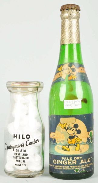Lot of 2: Scarce Disney Mickey Mouse Bottles.: Description Includes one half-pint milk bottle with Clarabelle Cow, Mickey, and Minnie etched in back and one Ginger Ale bottle with Mickey Mouse label and original Mickey Mouse cap. Decals have some 