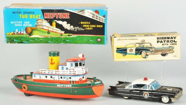 Lot of 2: Tin Vehicle Toys.: (Very Good). Largest, box: 15 - 1/4" L. Japanese. Working. Includes one friction Highway Patrol Cadillac and one battery-operated Neptune Tug Boat. Includes both original boxes, Tug Boat box with card