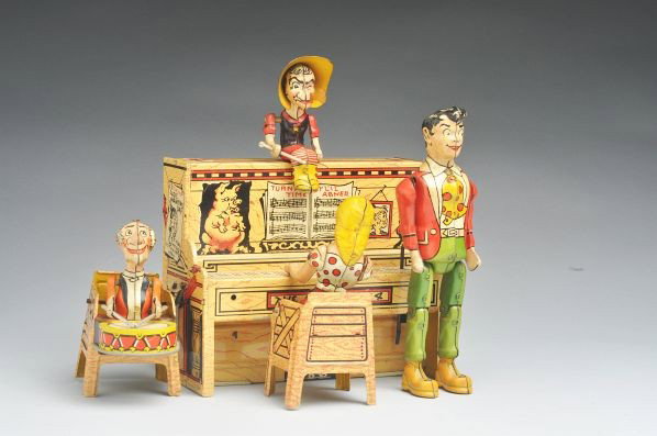 Tin Litho Unique Art Lil' Abner Band Wind-Up Toy.: Description American. Working sporadically. Minor scratching and wear throughout.Condition (Very Good). Size 9" L. ADDITIONAL INFO: Mammy figure is included, as seen in updated photo.
