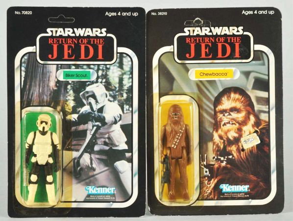 Lot of 2: Star Wars Carded Figures.: Description Return of the Jedi. Includes Chewbacca with price sticker on front of card and Biker Scout. Both with some edge wear.Condition (C7, Very Good).