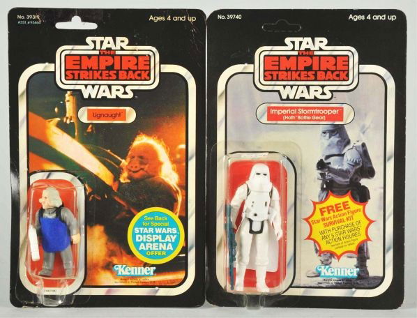Lot of 2: Star Wars Carded Figures.: Description Empire Strikes Back. Includes Hath Stormtrooper and Ugnaught (punched). Both with minor edge wear.Condition (C7, Very Good).
