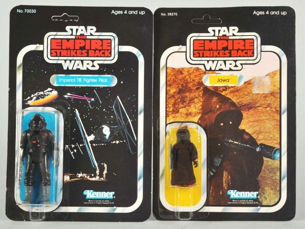 Lot of 2: Star Wars Carded Figures.: Description Empire Strikes Back. Includes Tie Fighter Pilot and Jawa with sticker residue on card.Condition (C8, Excellent).