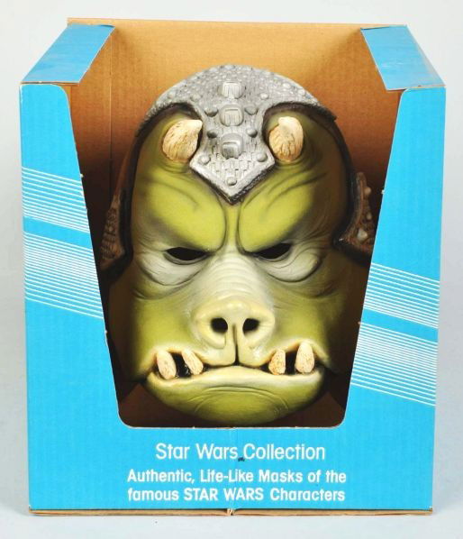 Star Wars Don Post Gamorrean Guard Mask.: Description Includes original box with some slight creasing.Condition (Excellent). Size Box: 12" x 11" x 11".