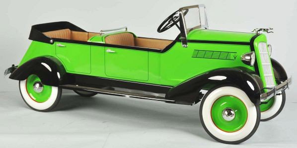 Pressed Steel Custom Built Ford Pedal Car Toy.: Description 1936. This came from an original car that was designed with remanufactured parts, using the finest workmanship and material offered. Outstanding appearance with beautiful upholstery and st