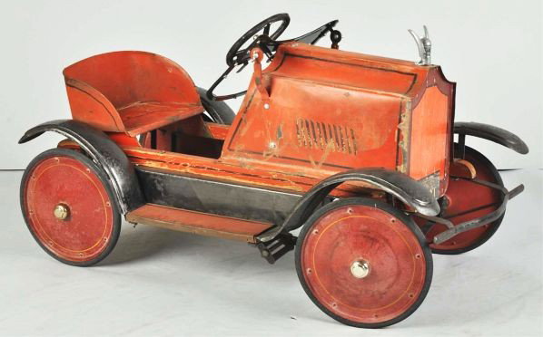 Pressed Steel Gendron Willys-Knight Pedal Car Toy: Description 1930s. Early car with original wood frame and metal work. Old over-brushed paint applied years ago. Complete car with good overall appearance.Condition (Good). Size 40" L.
