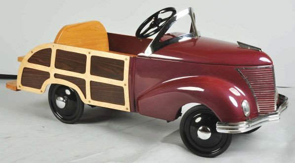 Garton Woody Ford Wagon Pedal Toy.: Description 1940s. Pressed steel. Professional restoration to an original car, duplicating all of its original woodwork and trim.Condition (Restored). Size 48" L.