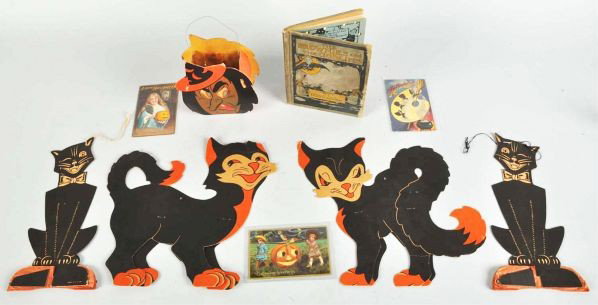 Lot of Halloween Pieces.: Description Includes cardboard double sided witch lantern, The Brownies and The Goblins book, three rare postcards and four cardboard die-cuts.Condition (Excellent). Size Largest: 12" x 13".