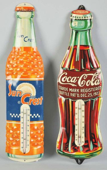 Lot of 2: Embossed Tin Thermometers.: Description 1932 and 1940s. Includes one for Coca-Cola and one for Sun Crest. Only light wear, a few small scratches, and a few nicks to the Coca-Cola thermometer and almost no wear or marks noted on 