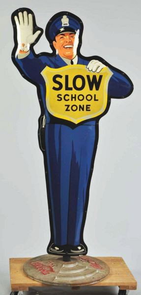 Coca-Cola School Zone Policeman.: Description 1962. Nice, clean, and bright example with one shallow dent to the front left arm. Complete with marked "Coca-Cola" base and interior t-shaped metal framework. Only a few small scuffs and 