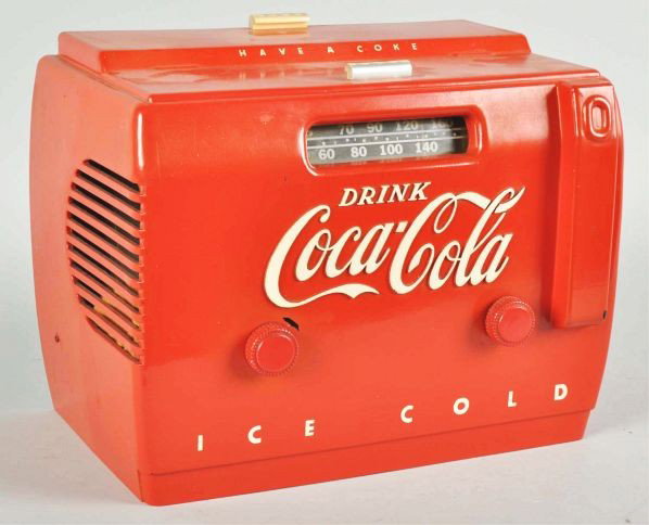 Coca-Cola Cooler Radio.: Description 1950s. Good color remains. A few minor rubs, color chips, and wear. Grille cloth is present but has fallen down from its original spot, in front of the speaker. Currently not operational b