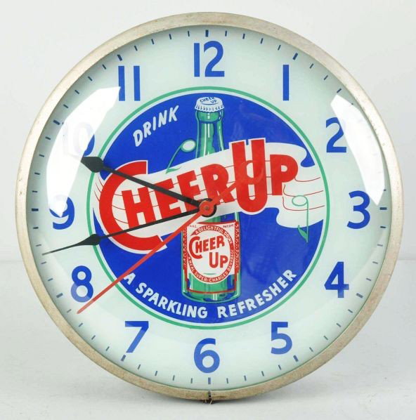 Electric Cheer Up Light Up Clock.: Description 1940s to 1950s. Very clean and bright with little to no wear or soiling. Only some outer case wear and soiling.Condition (Excellent). Size 15" Dia.