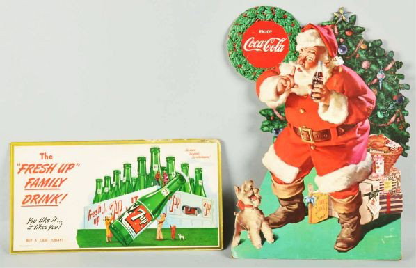 Lot of 3: Cardboard Soda Signs.: Description 1940s to 1960s. Some slight fading to the Green River and some edge wear to the 7up and Coca-Cola Santa.Condition (Very Good - Excellent). Size Largest: 24" x 16".