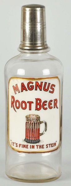 Magnus Root Beer Syrup Bottle.: Description Fantastic reverse on glass painted label depicting a glass of Magnus Root Beer. Reads, "It's fine in the stein" across the bottom. All original, beautiful condition.Condition (Excellent Pl