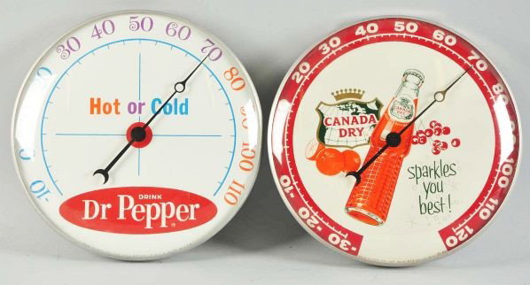 Lot of 2: Pam Thermometers.: Description 1960s to 1970s. Includes Dr. Pepper and Canada Dry. Both are very clean with only light dust or soiling.Condition (Near Mint). Size Each: 12" Dia.